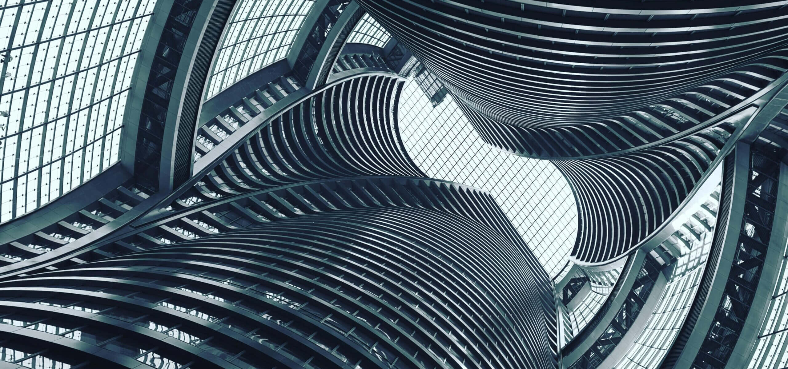 The Path to Sustainable Corporate Management Low-angle Photography of Gray Spiral Building